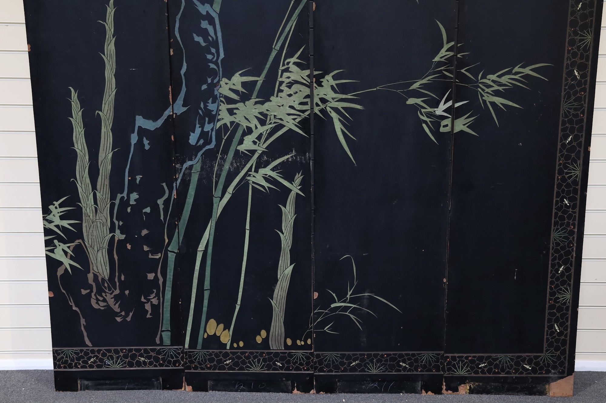 A tall Chinese coromandel lacquer twelve panel screen, 19th century, each leaf panel width 49cm, height 264cm